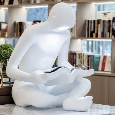 上海禾悉建筑设计 现代白色坐姿灯泡人